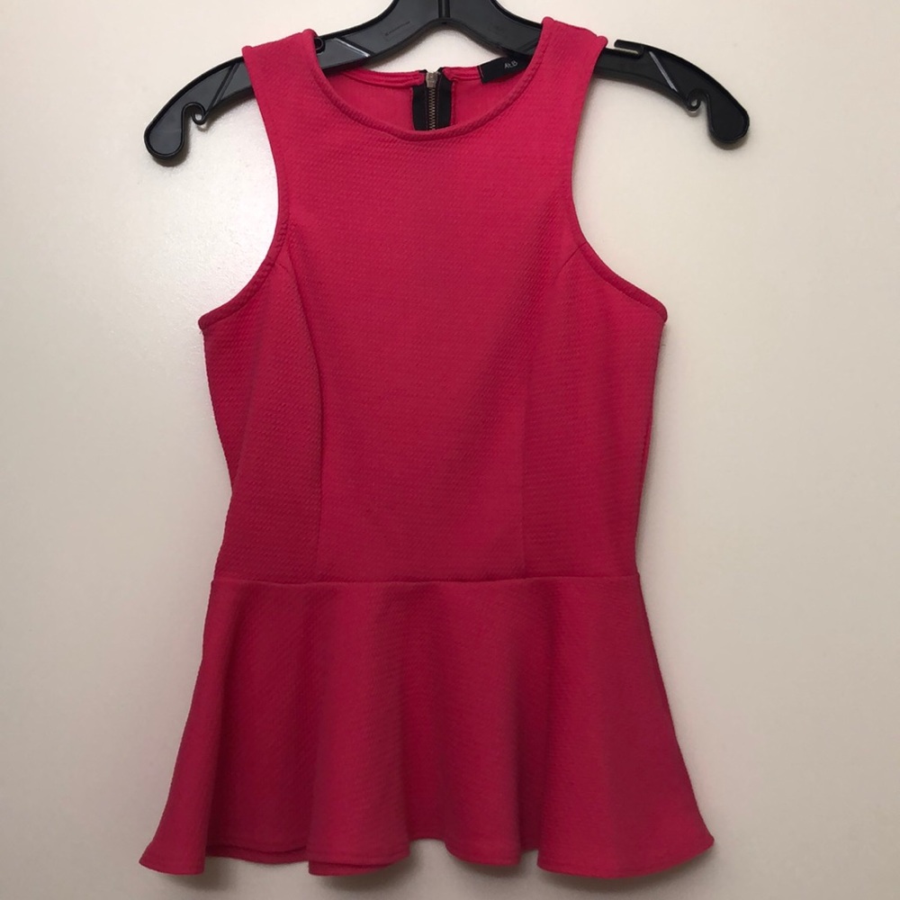 Pink peplum top.
